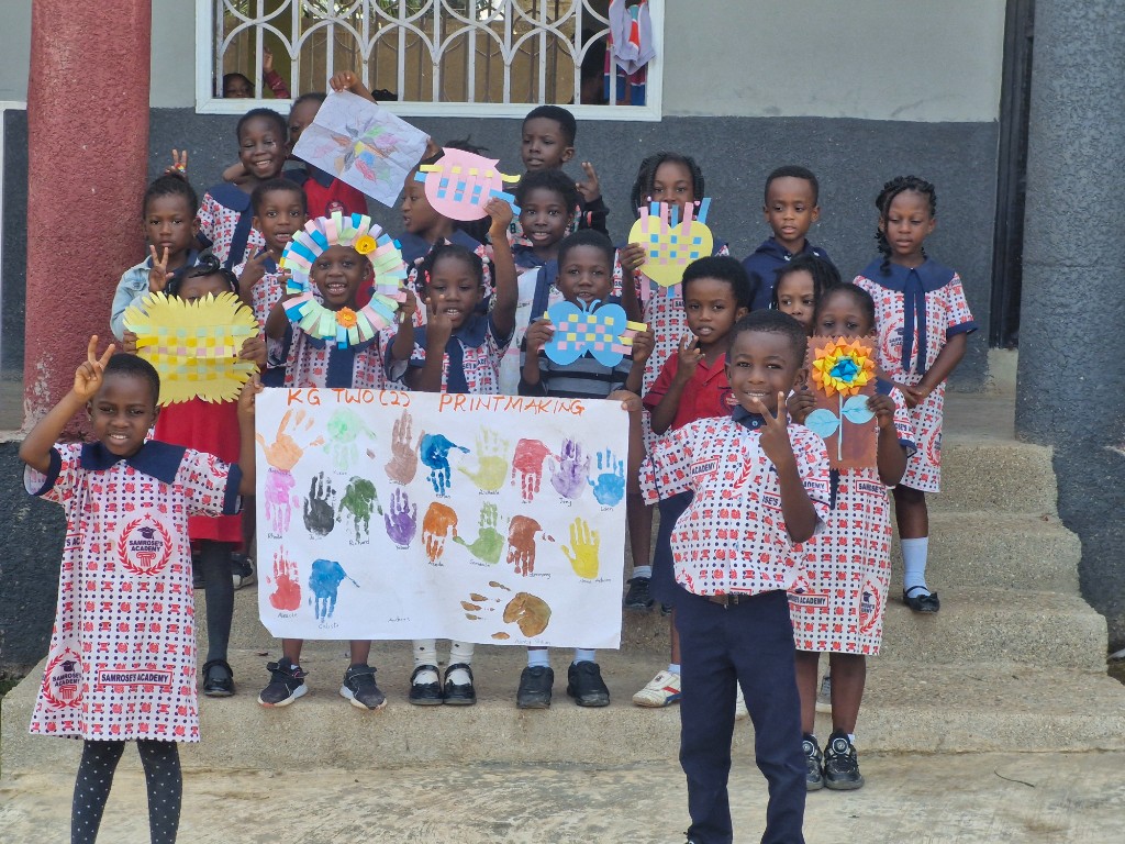 KG Two class displaying their printmaking handprint project